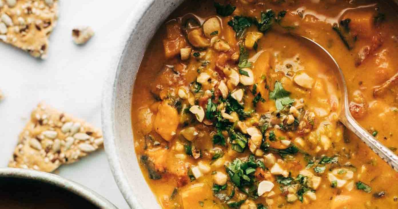 Spicy Peanut Soup With Sweet Potato + Kale | Recipe Cloud App